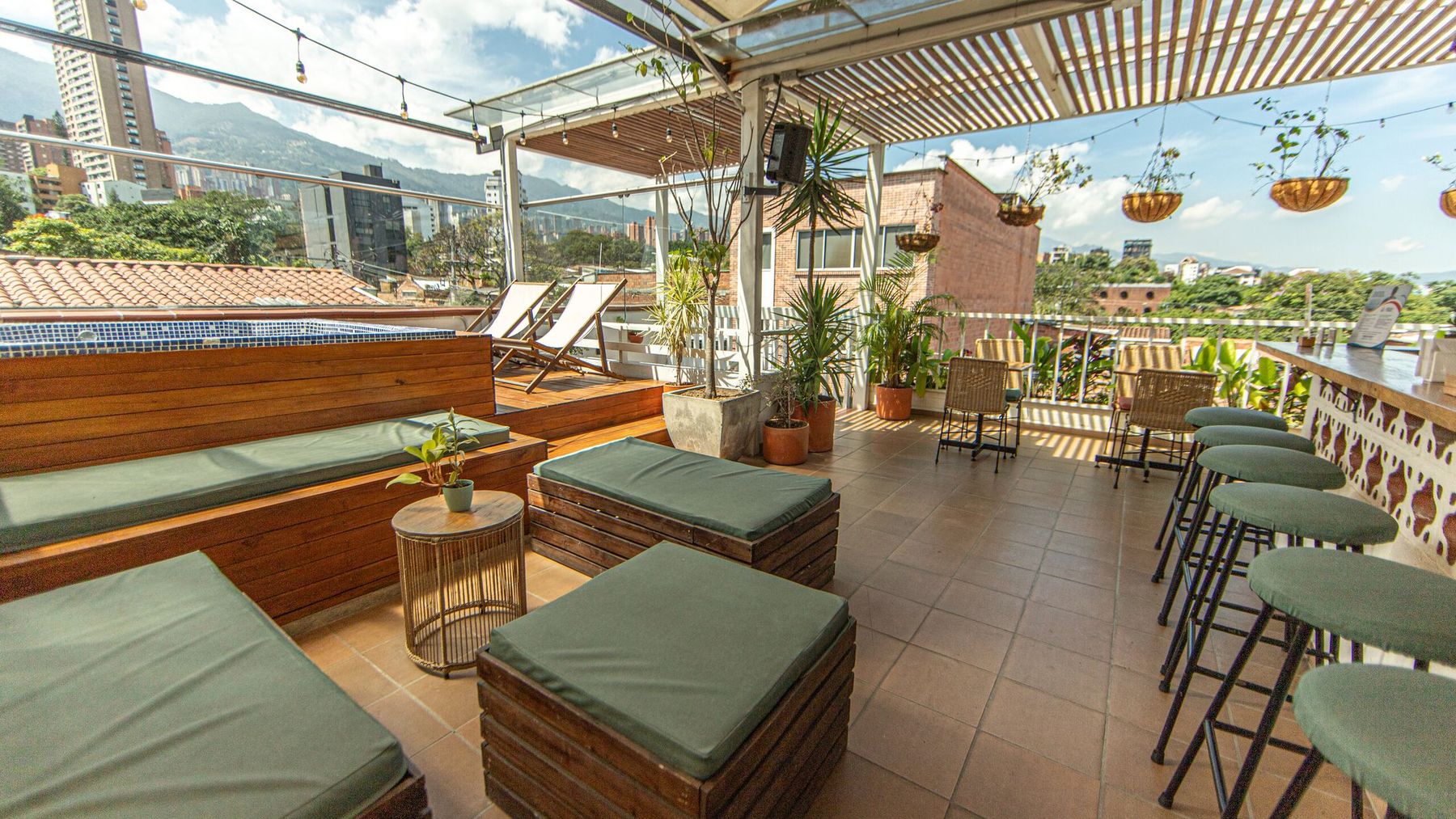 The rooftop by day with the mountains beyond.