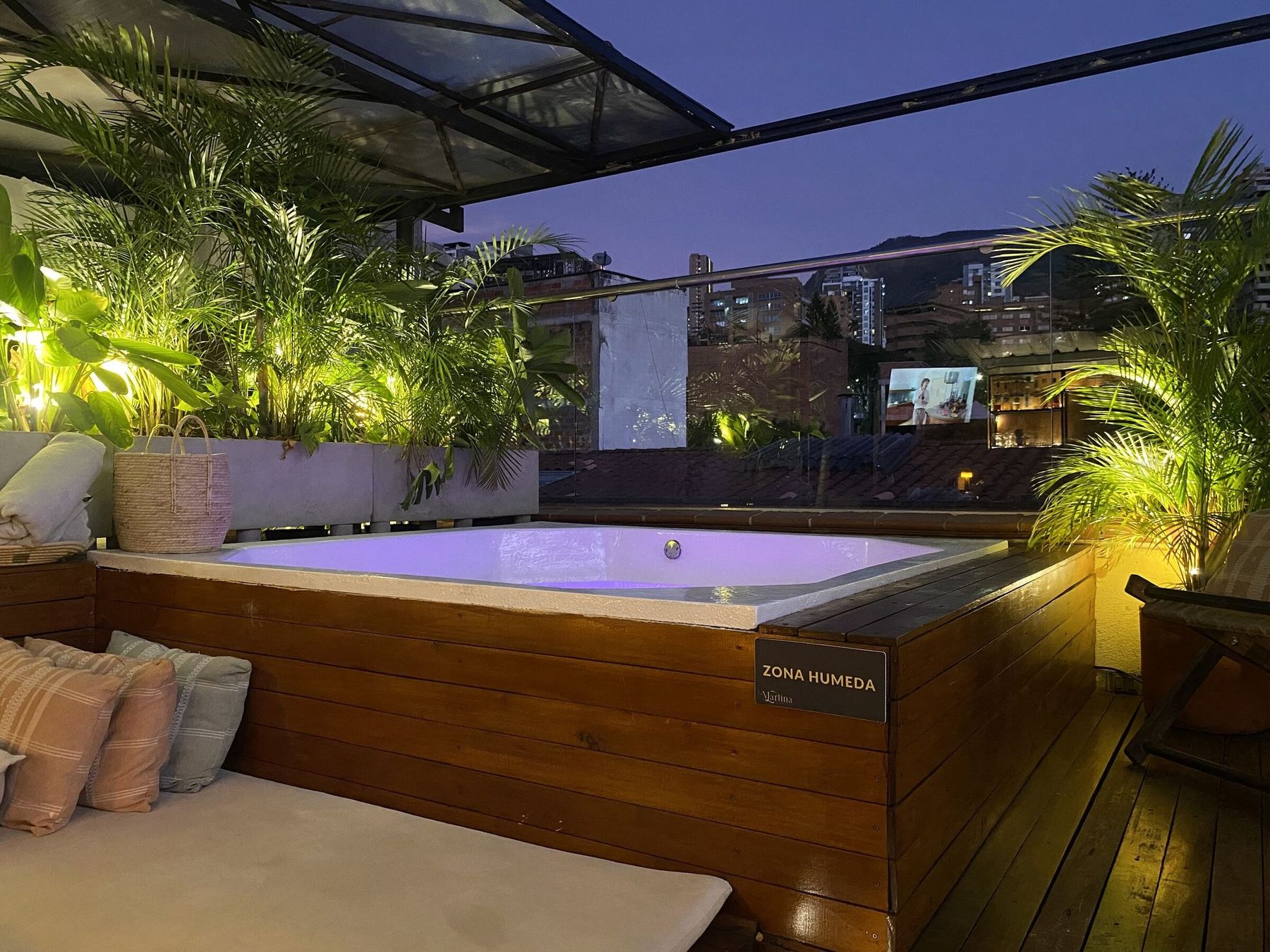 The jacuzzi lit at dusk.